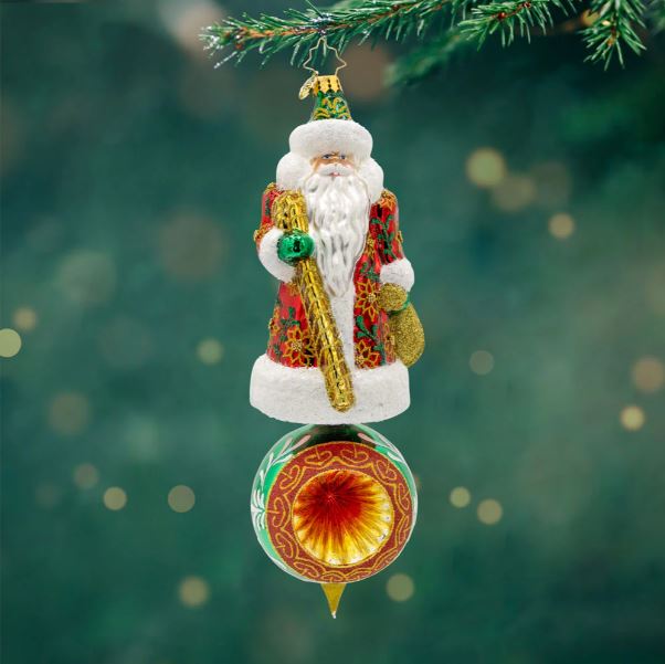 Regal Reflections Santa glass ornament with a red floral coat and a green reflector ball base.
