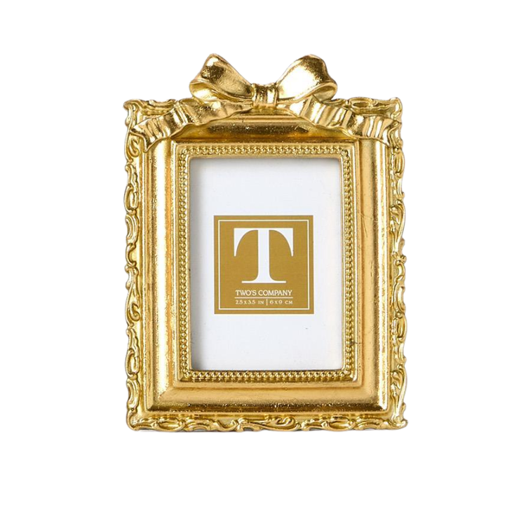 Gold mini photo frame with ornate edges and a decorative bow on top.