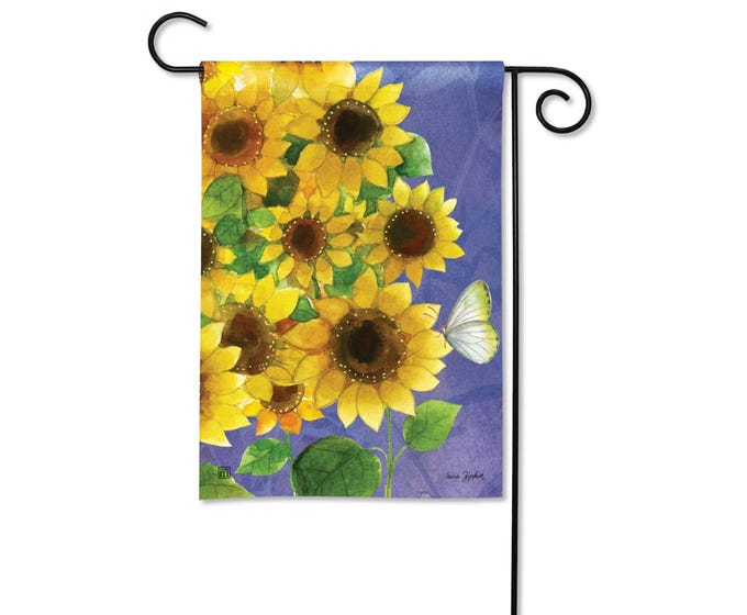 Green garden flag featuring a white floral vine pattern on a rectangular fabric banner.