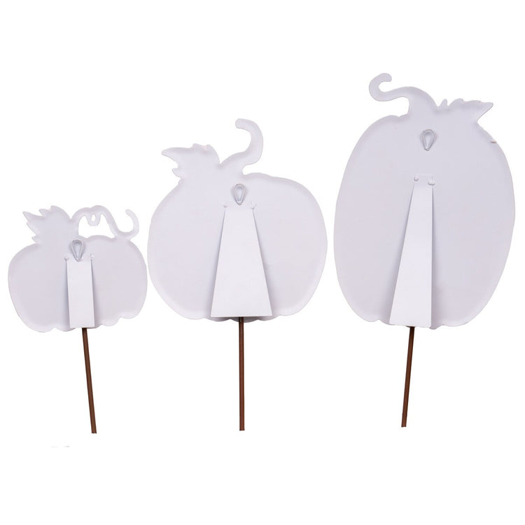 Back view of three white watercolor pumpkin decorations with stakes, easels, and hanging loops.