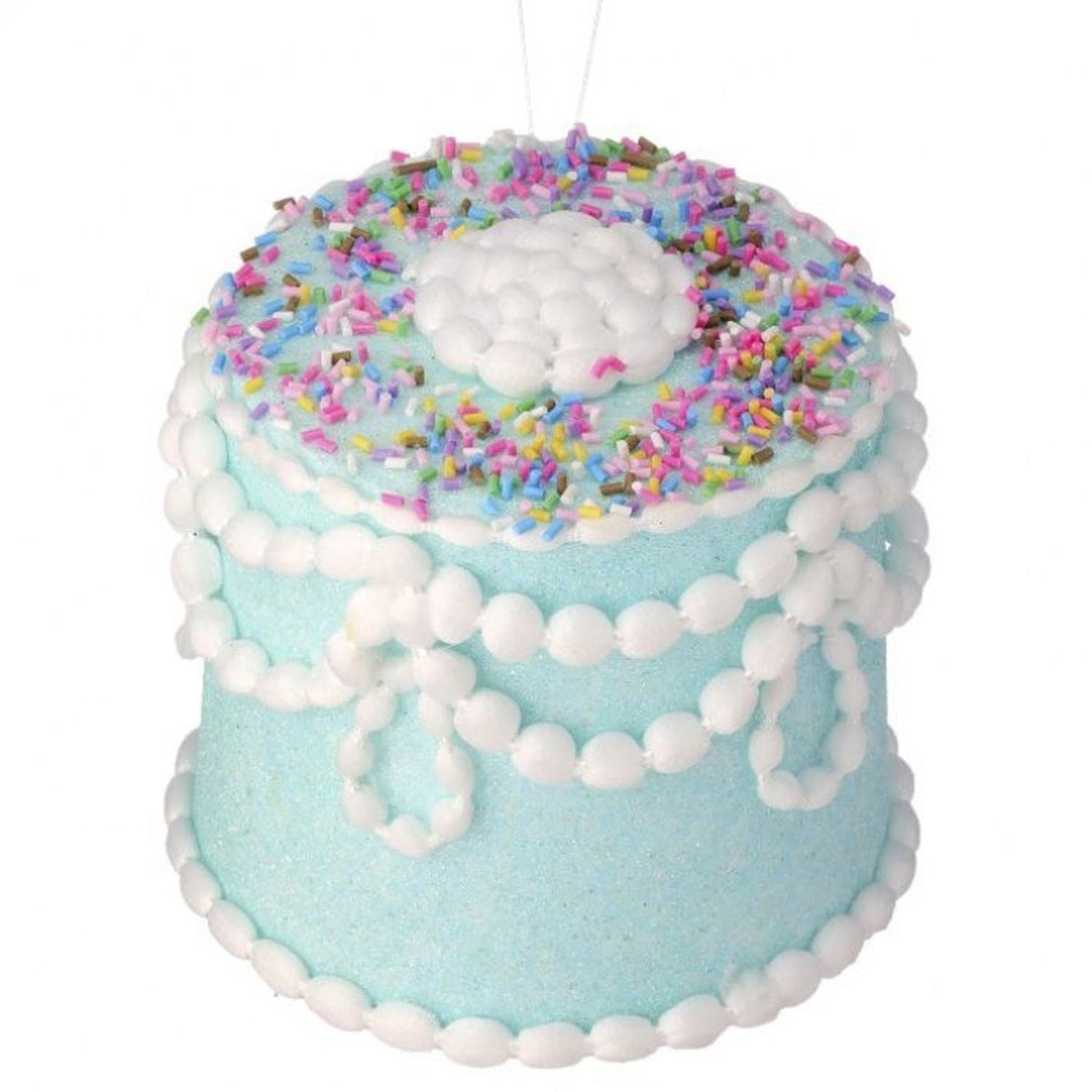 Five-inch pastel candy decorated cake ornament with detailed icing patterns.