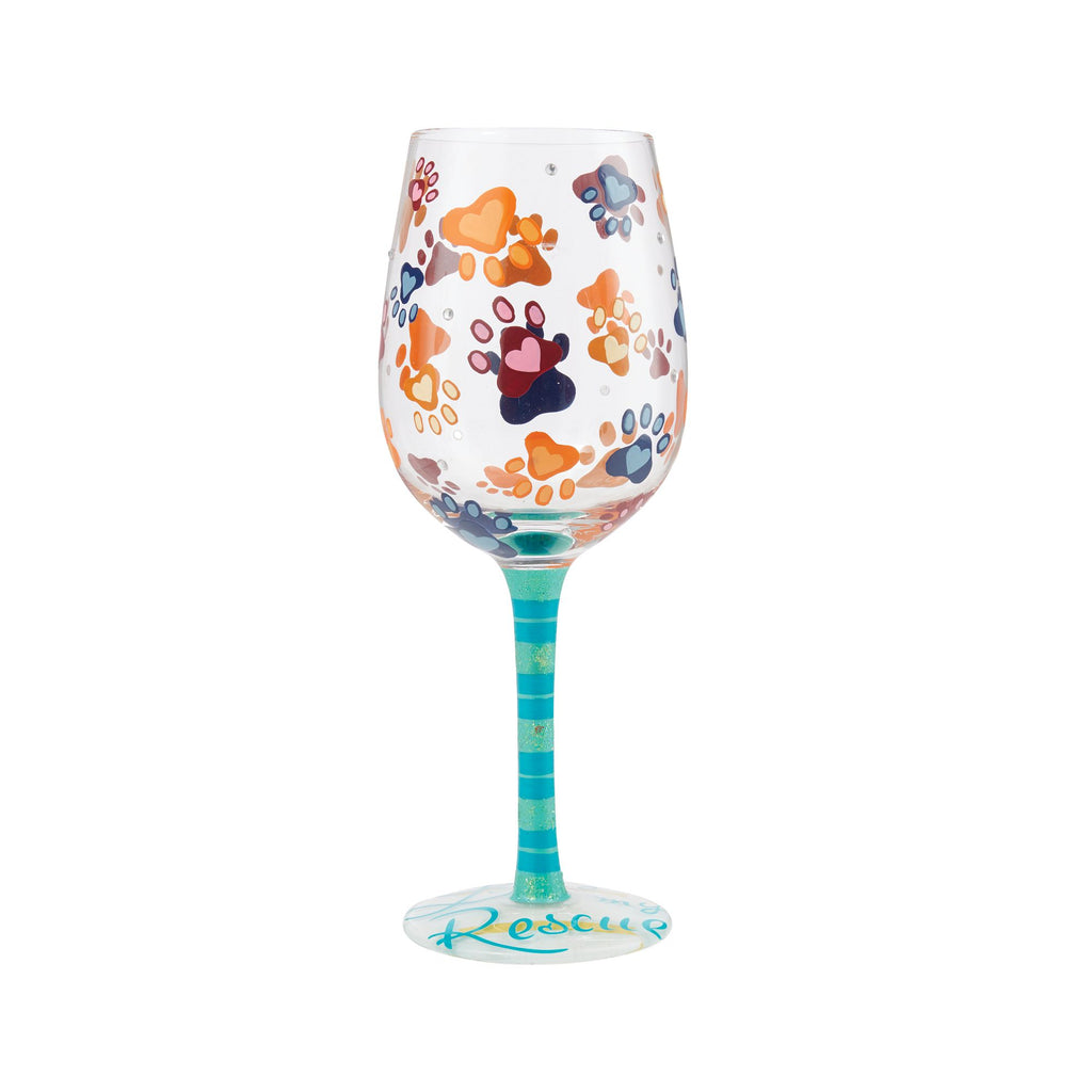 Blown glass wine glass with hand-painted floral designs, glitter accents, and a cocktail recipe printed on the base.