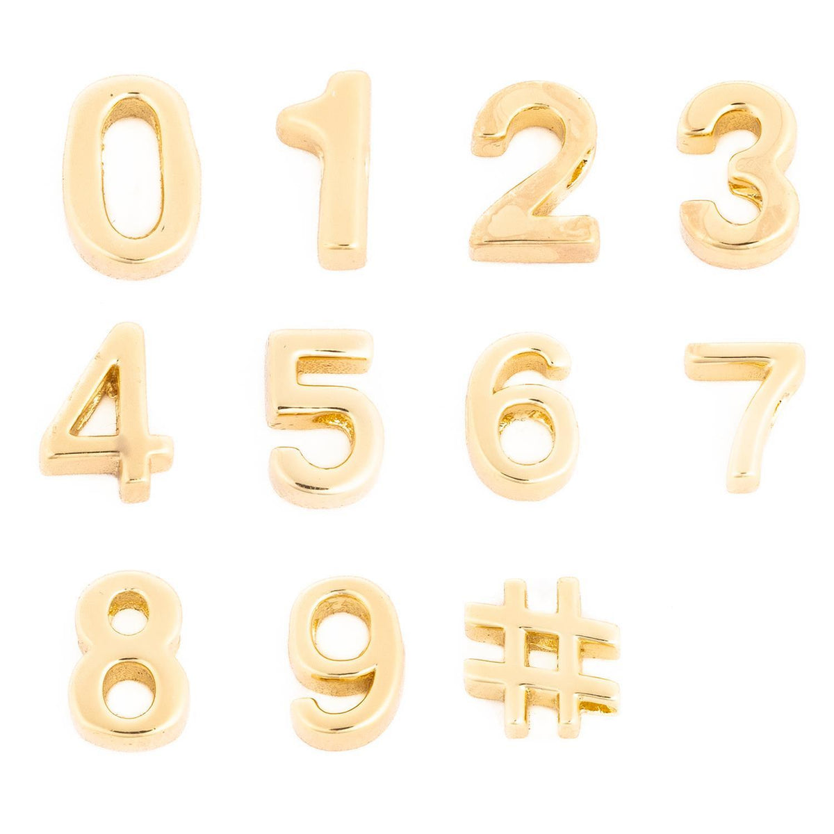 Set of 18k gold plated number charms from zero to nine and a hashtag symbol.