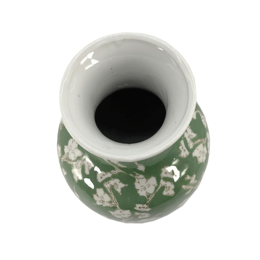 Green ceramic vase with white sakura floral chinoiserie pattern