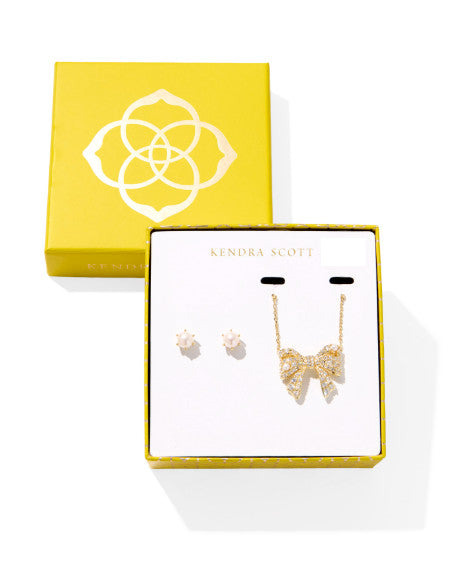 Krista Bow Short Pendant Necklace with sparkling bow pendant on a pearl stud earring set