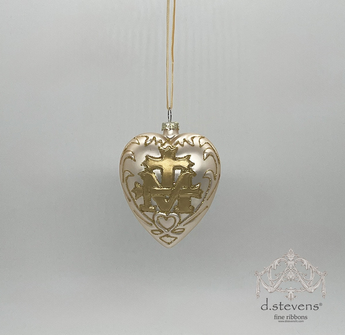 4-inch platinum glass heart-shaped ornament with a gold crest and glitter accents.
