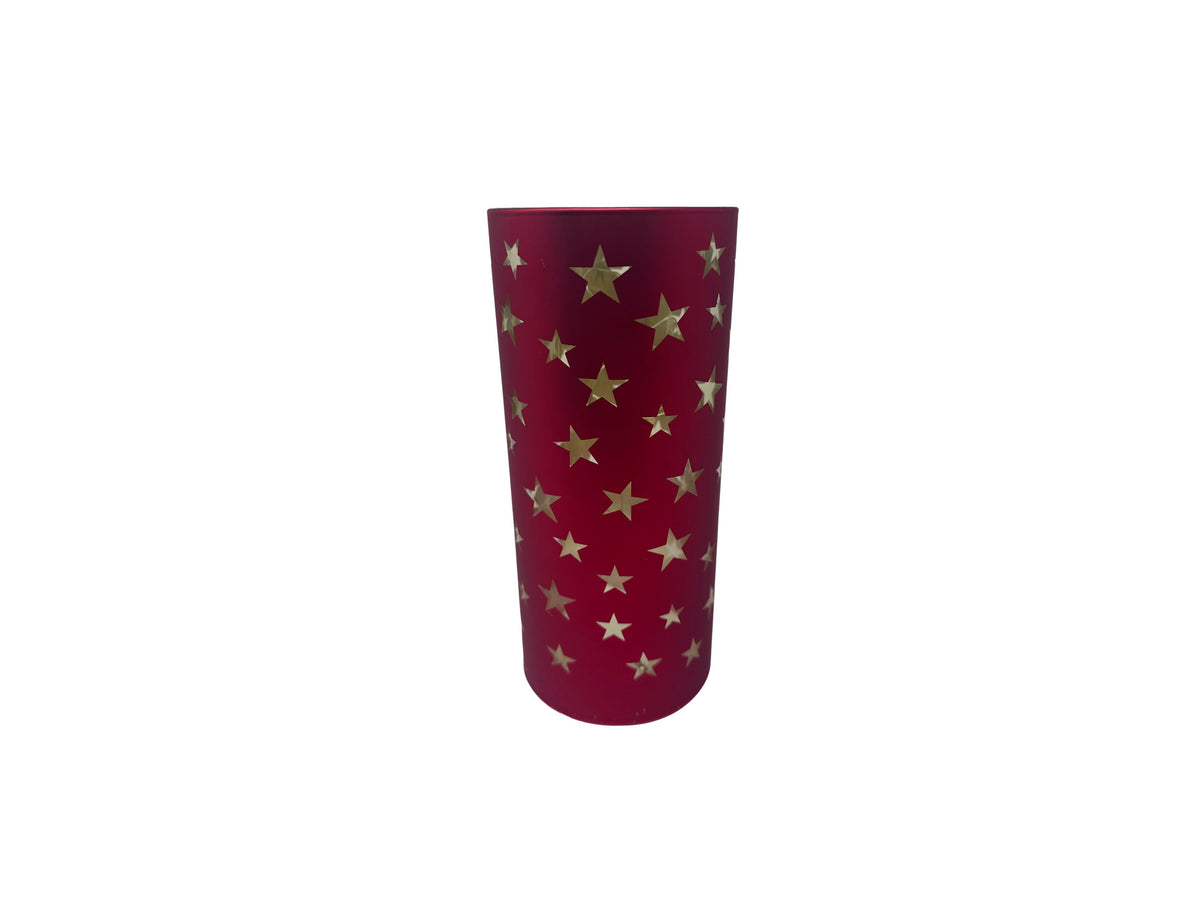 Tall red glass cylinder with a gold starburst pattern and LED lighting.