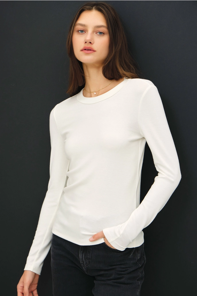 Audrey round neck long sleeve knit top in soft stretchy material with relaxed slim fit silhouette.