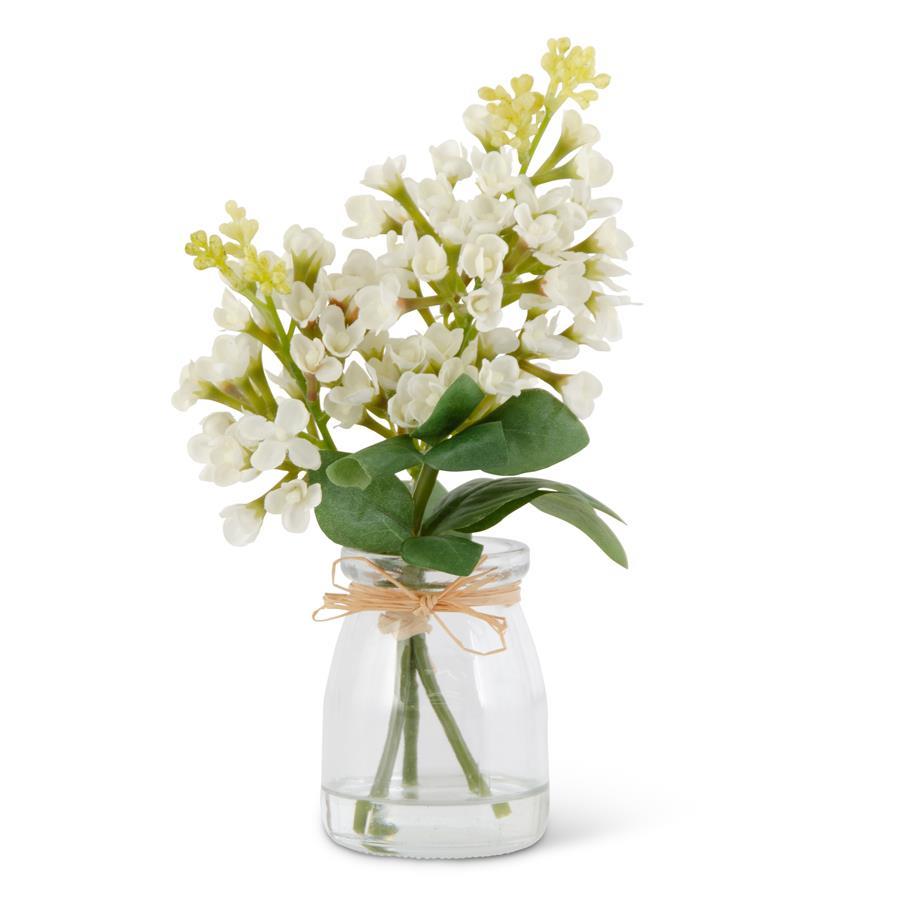 9-inch white glass vase with lilac faux flowers in artificial water