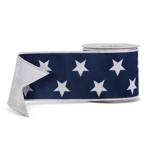 Four-inch wide blue polyester wired ribbon with white stars on a dark background.