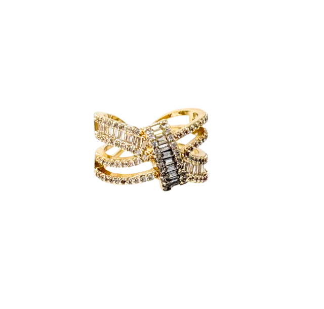 Gold fashion statement ring with multiple bands and baguette-cut diamond accents.
