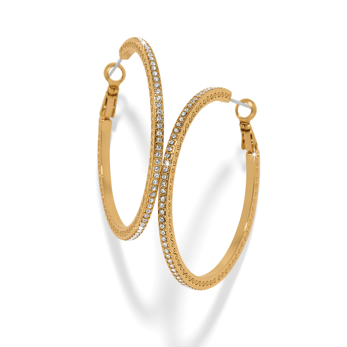 Gold plated thin large hoop earrings with lever back posts featuring fine quality crystals.