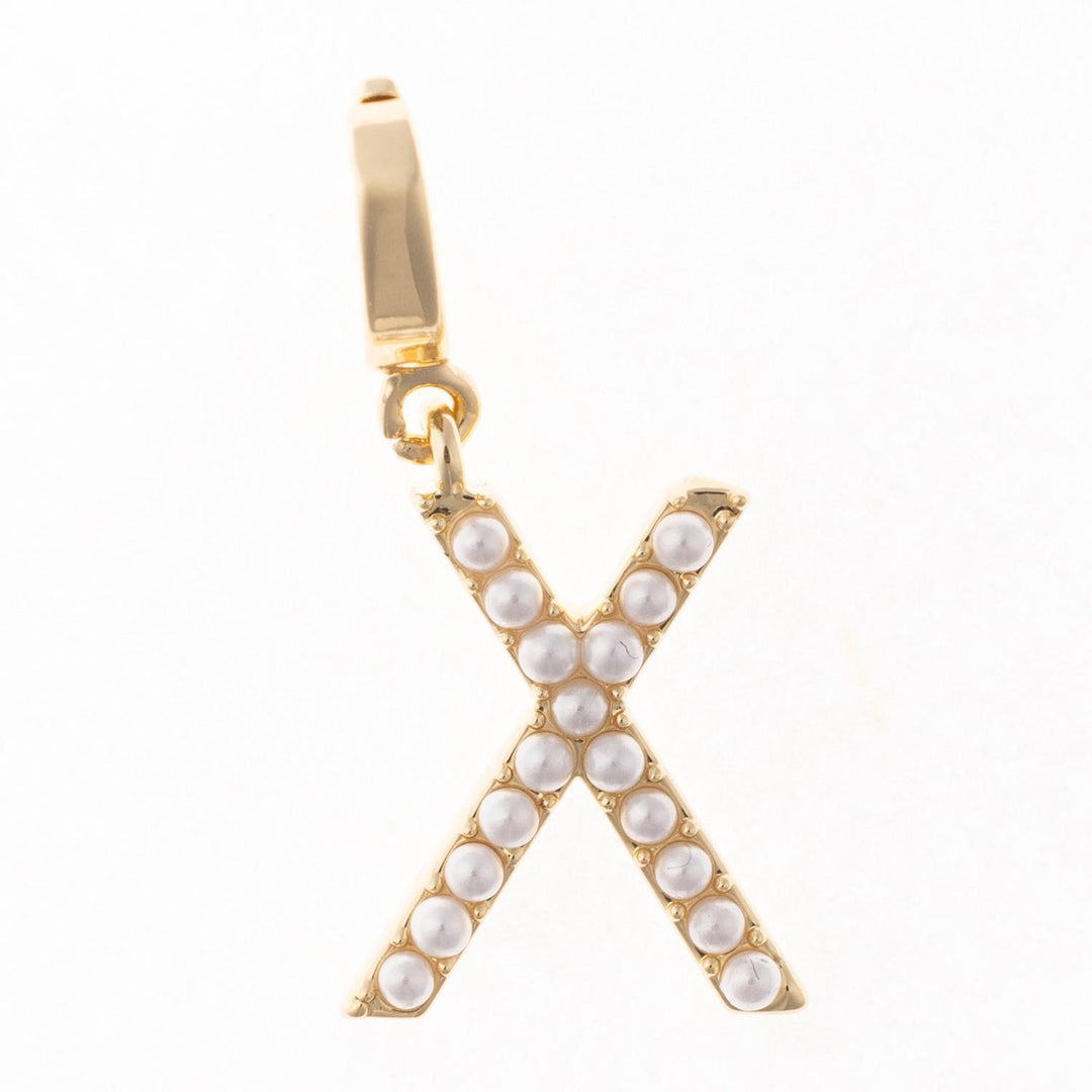 Gold-plated letter X charm with pearl inlay and a clasp for attachment.