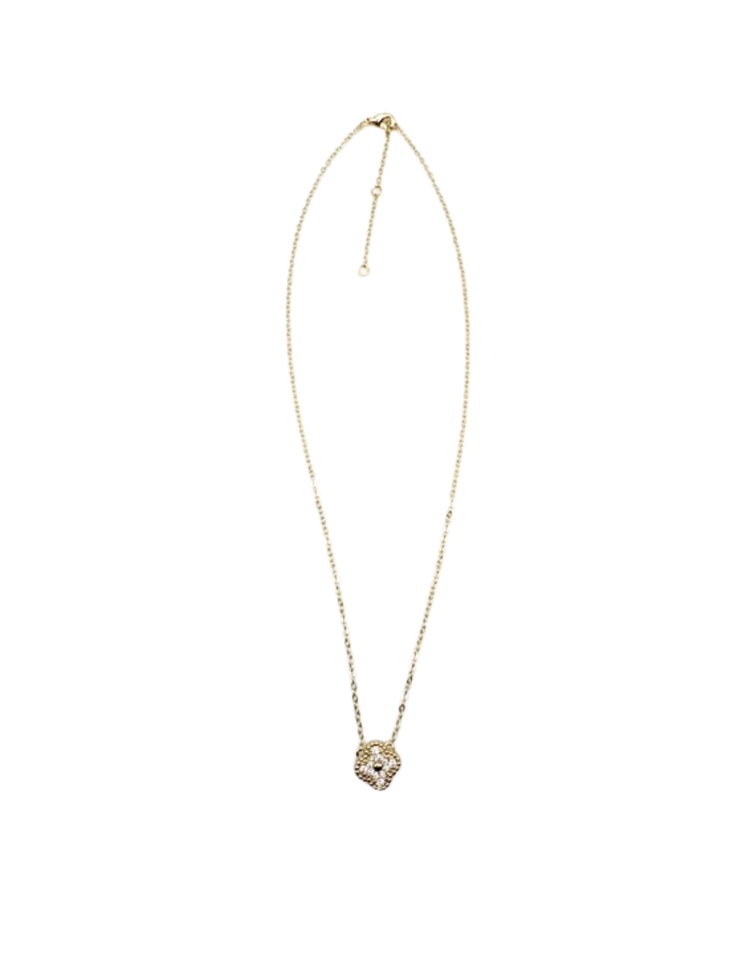 Gold chain necklace featuring a four-leaf clover pendant set with sparkling cubic zirconia stones.