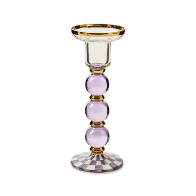 Hand-painted glass candlestick with gold luster accents, standing tall.