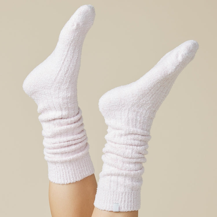 Slouchy marshmallow socks in heathered gray with non-slip grippers on the sole.