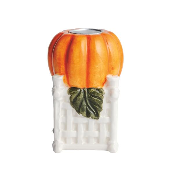 Hand-painted dolomite pumpkin topiary taper candle holder with a white lattice base and green leaf.