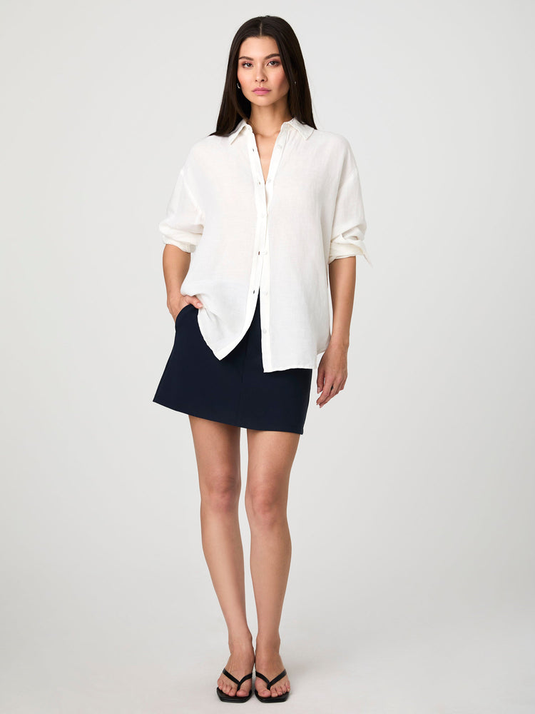 Oversized Ellie Birdie shirt in light linen blend with spread collar, button front, and cuffed long sleeves.
