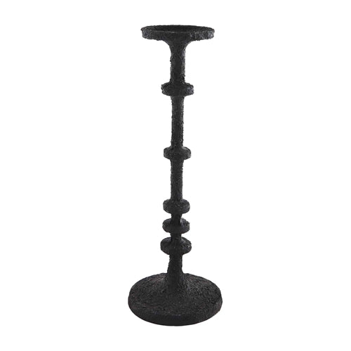 Black metal candlesticks with a sleek cylindrical silhouette