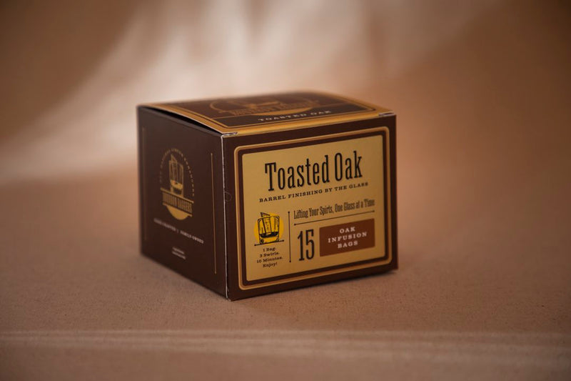 Bourbon Enhancers teabag with cinnamon sticks inside a clear windowed packaging.