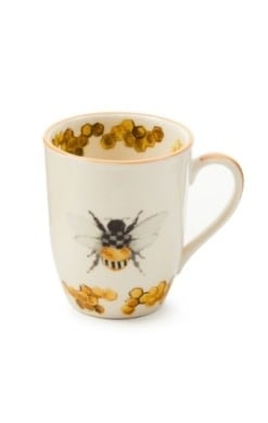 Handmade stoneware mug with a queen bee graphic on white ceramic.