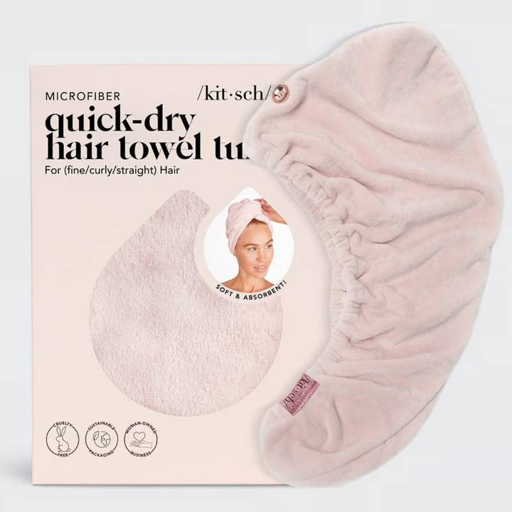 Blush-colored quick-dry hair towel made from organic cotton and bamboo with stretch elastic trim.