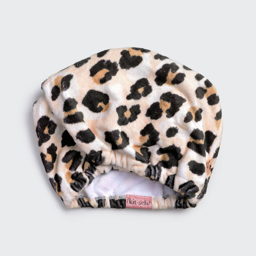 Leopard print quick dry hair towel made from organic cotton and bamboo with stretch elastic trim.