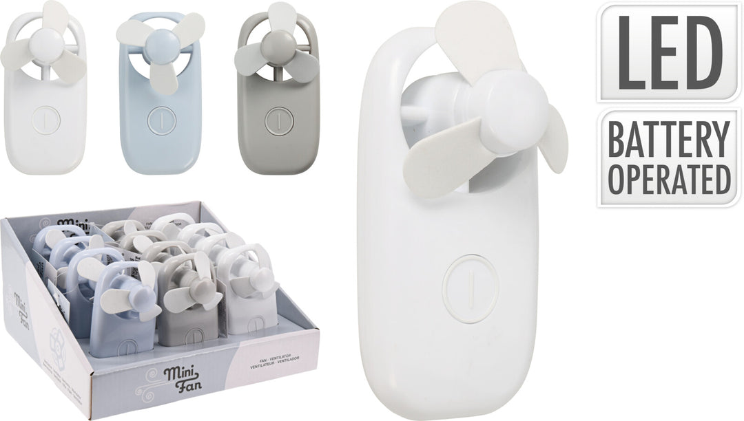 Handheld mini fans in white, blue, and grey with a display box and battery-operated label.