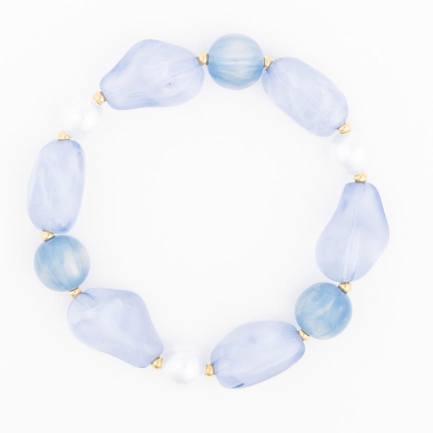 Zoe Bracelet featuring light blue marbled beads, white pearls, and gold-tone spacers.