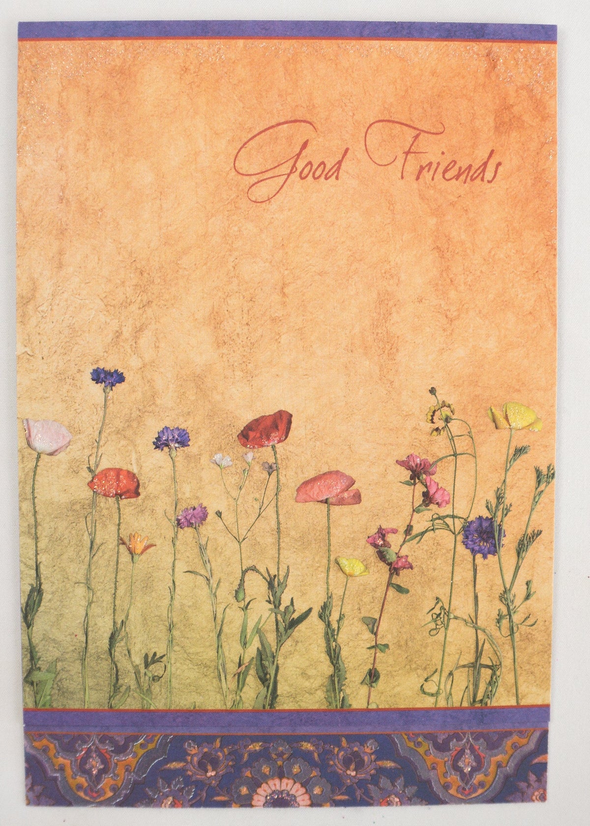 Birthday Wild Flowers card with glitter foil emboss die-cut floral pattern on white background