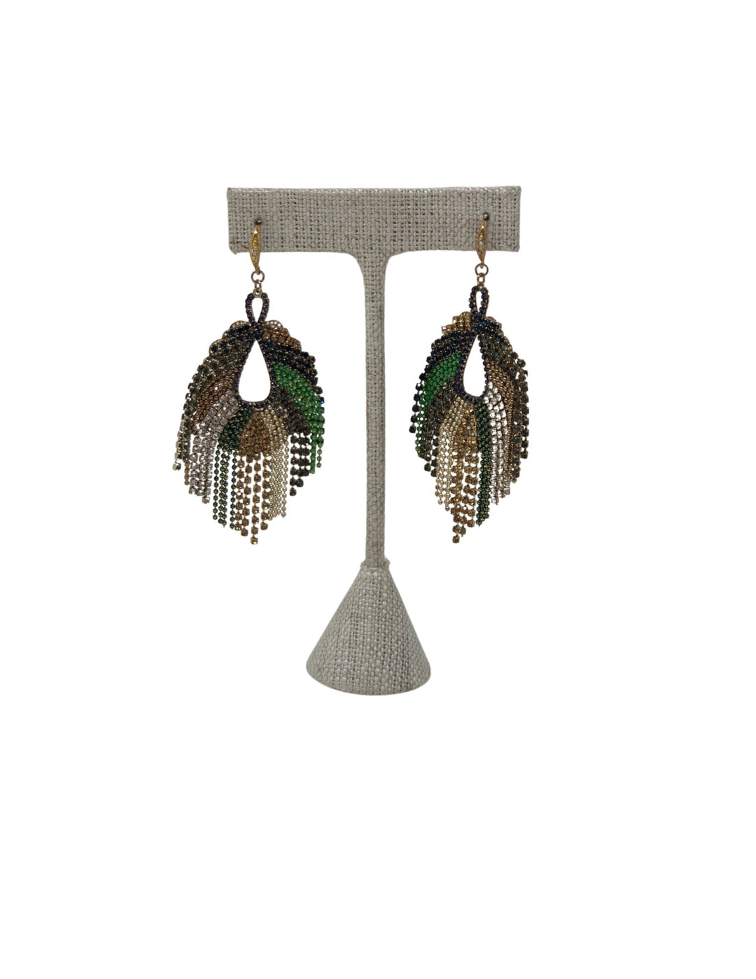 Forrest Crystal Dangle Earrings with green, gold, and black beaded fringe on a display stand.