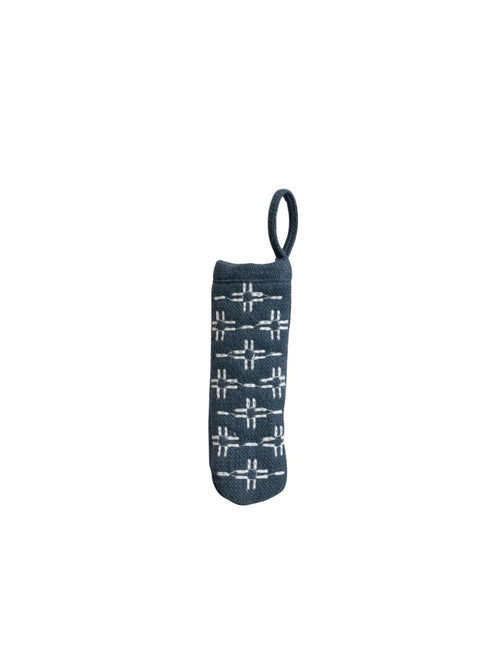 Cotton pot handle cover with embroidered floral pattern in beige featuring a hanging loop.