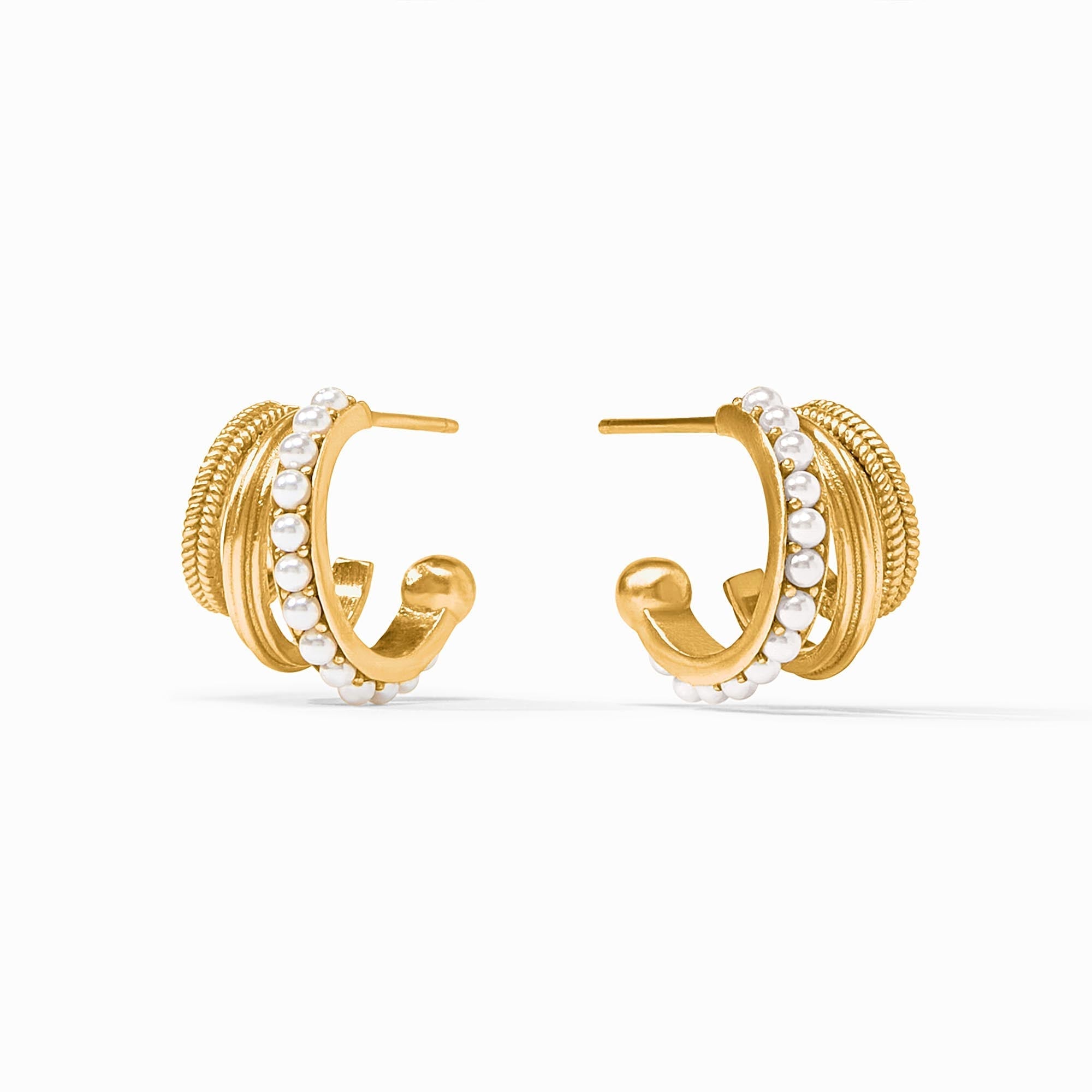 Triple hoop earring with gold plating, stone studs on the inner ring, fluted middle ridge, and braided outer layer.