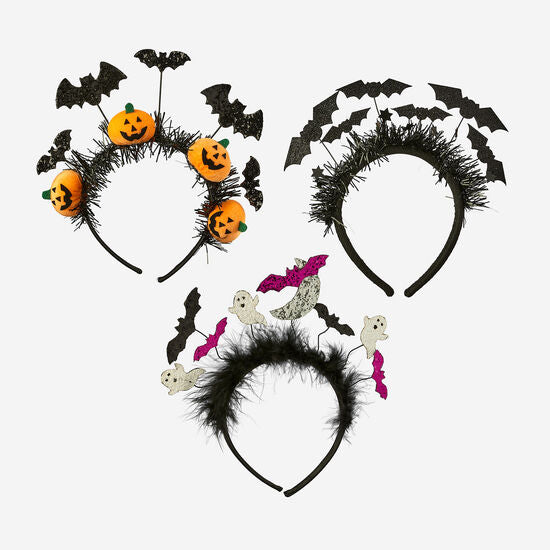 Flying bat headband made of black PVC with fabric accents in a stylized silhouette.
