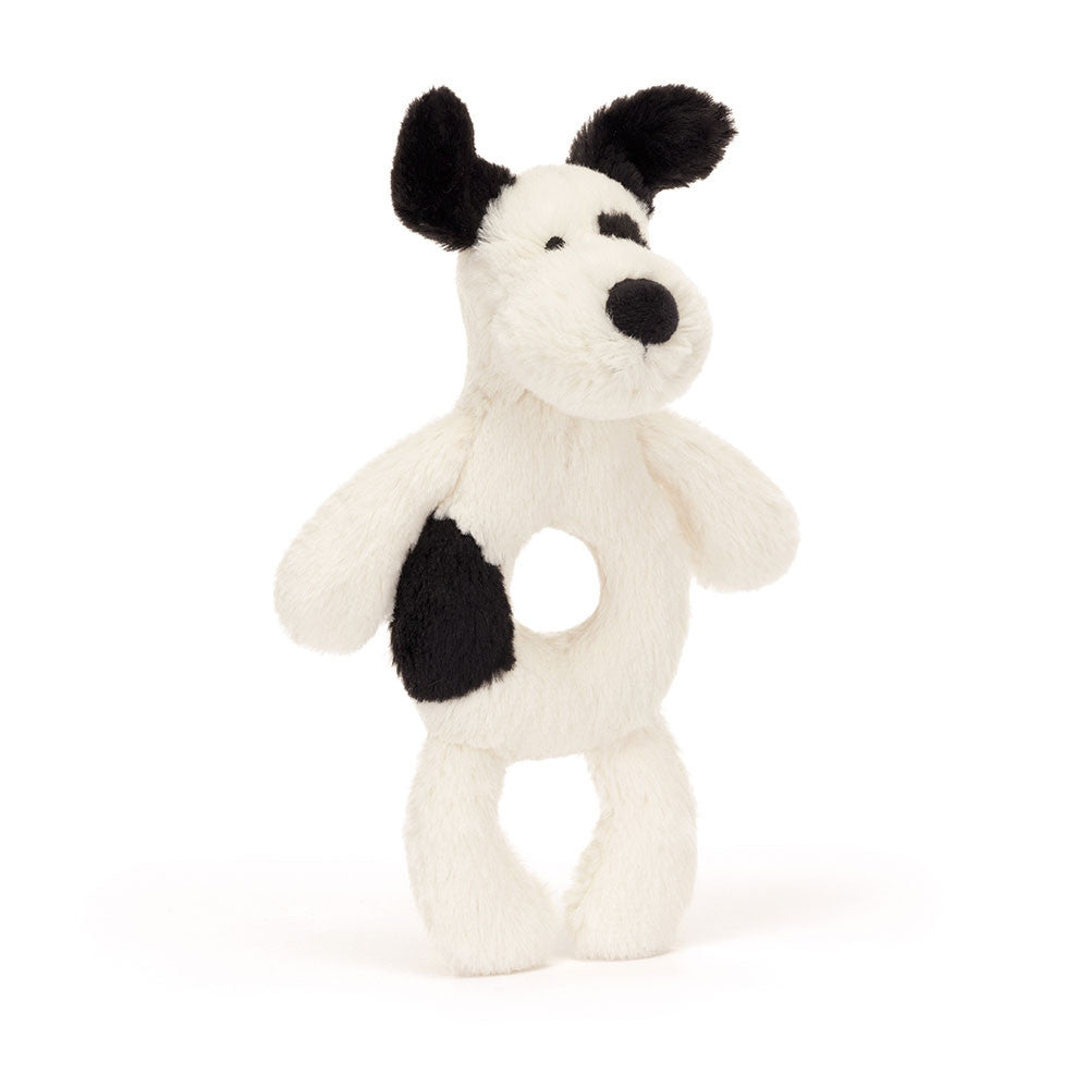 Bashful black and cream puppy ring rattle with embroidered eyes made from recycled polyester.