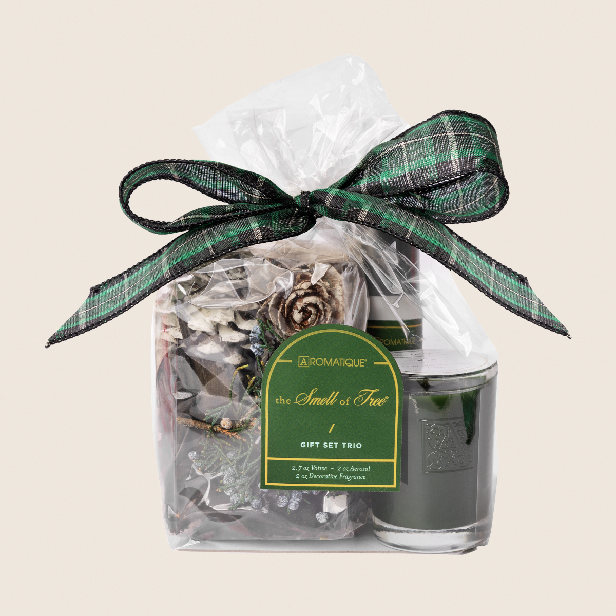 The Smell of Tree Gift Set Trio with potpourri, room spray, and a green votive candle in a gift bag.