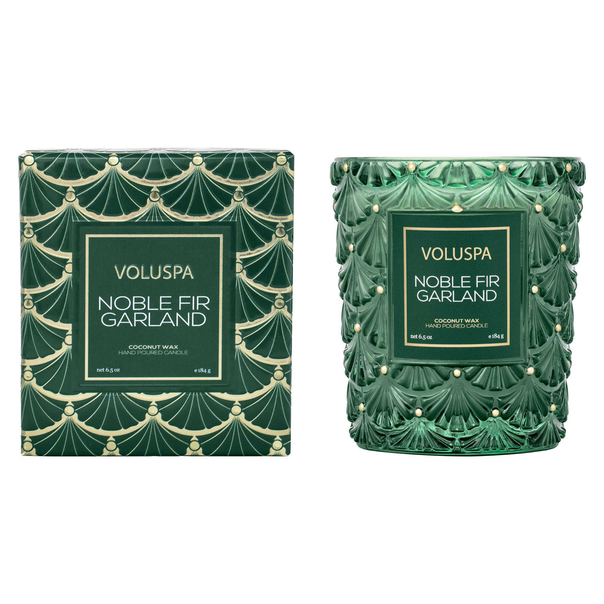 Voluspa Noble Fir Garland 6.5oz coconut wax candle in a green glass jar next to its matching box.