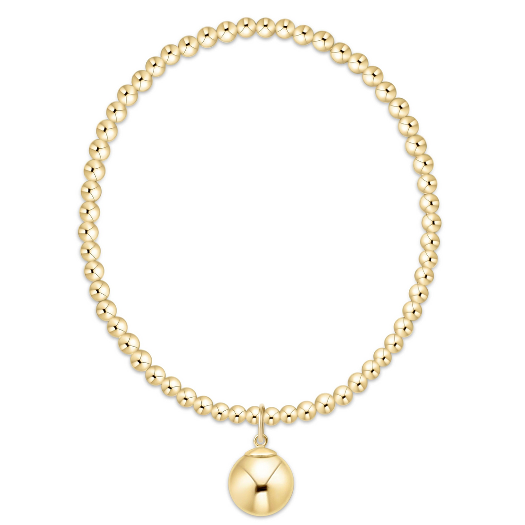 Classic gold 3mm bead bracelet with a single 10mm gold ball charm.