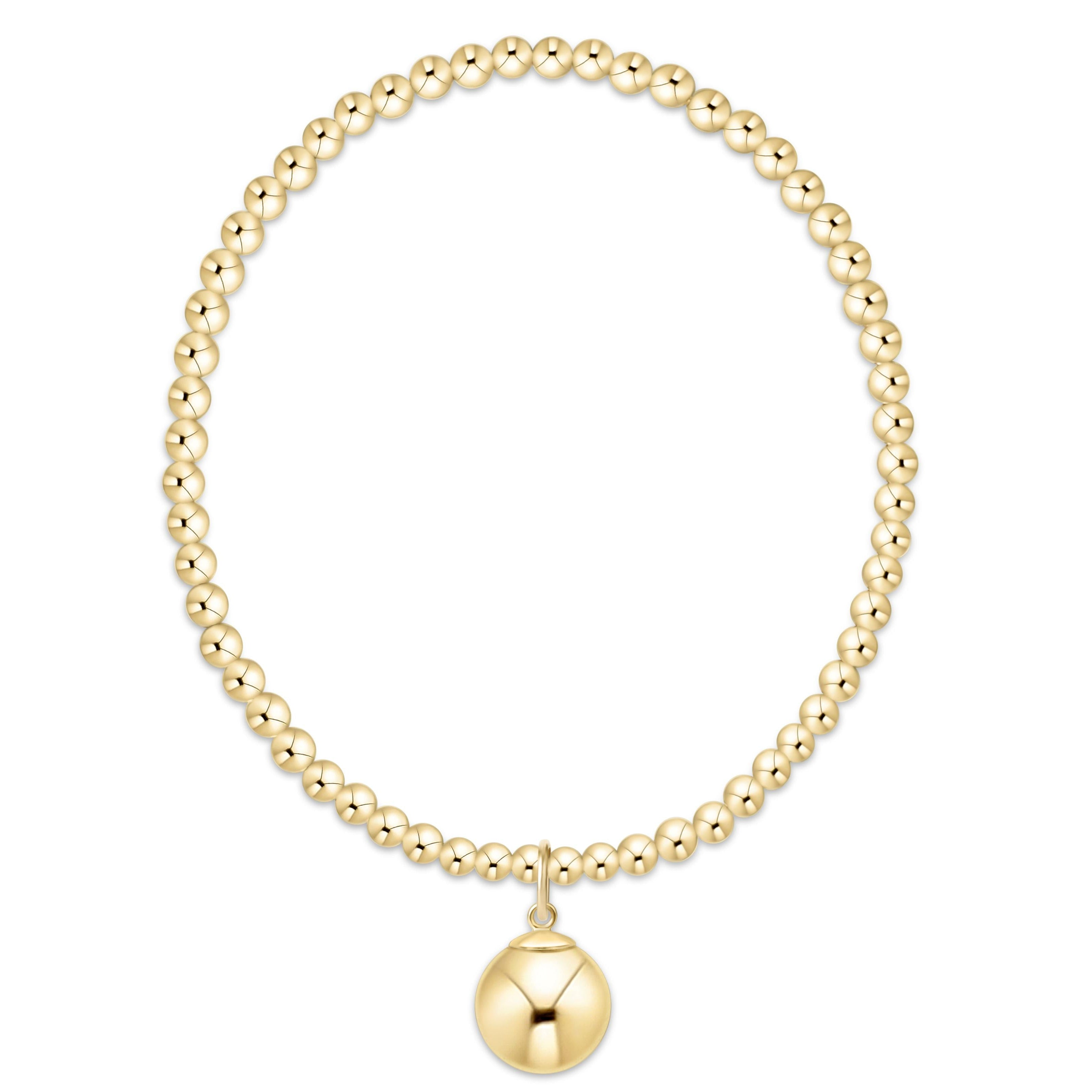 Classic gold 3mm bead bracelet with a single 10mm gold ball charm.