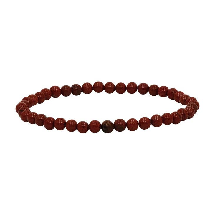 Mini Gemstone Bracelet featuring a classic beaded design with small gemstones in neutral tones.