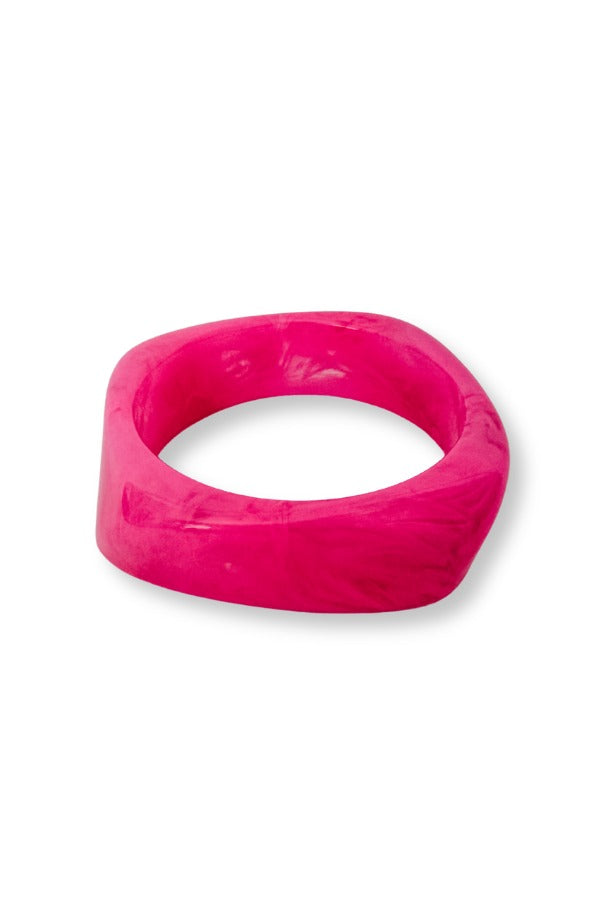 WS Colette Bangle in hot pink with a marbled resin texture and a chunky, rounded square shape.
