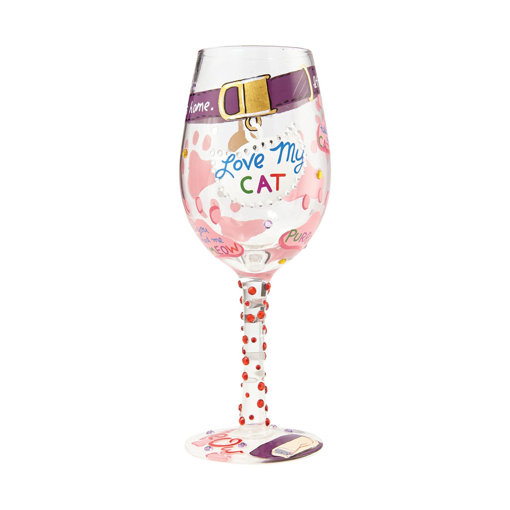 Blown glass wine glass with hand-painted floral designs, glitter accents, and a cocktail recipe printed on the base.