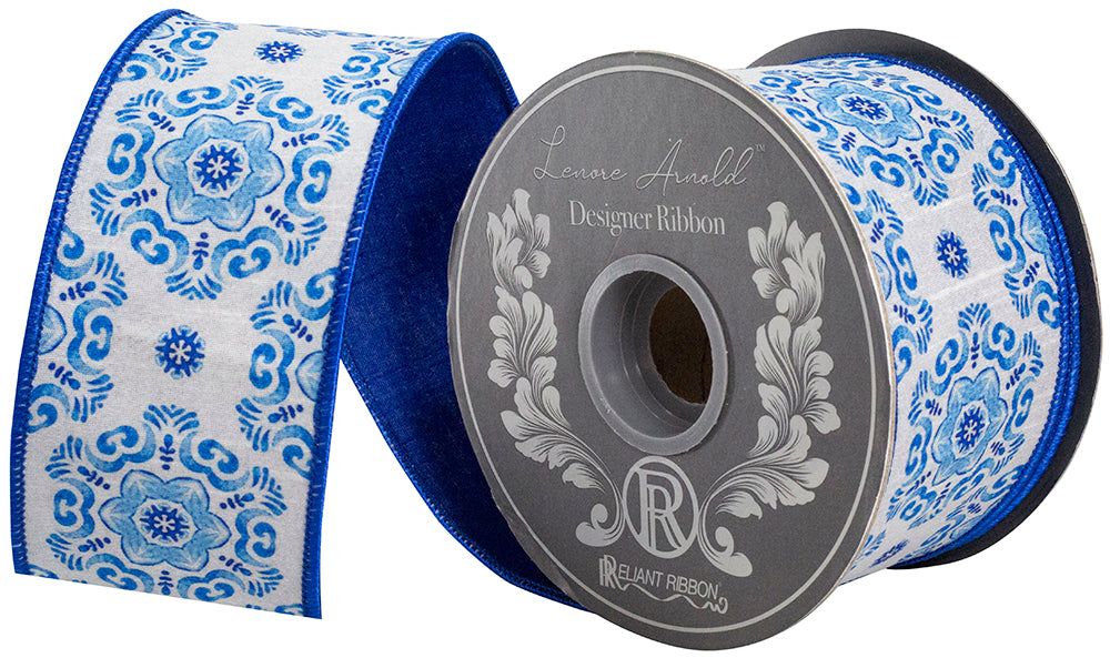 Porcelain Sentido blue and white patterned wired edge ribbon on a spool.