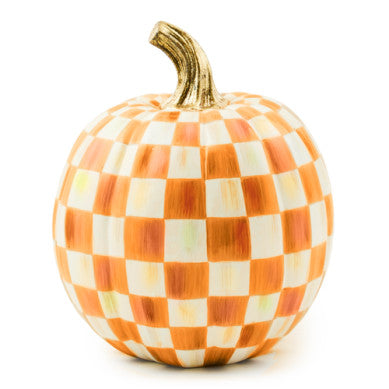 Small decorative pumpkin with an orange and white hand-painted checkerboard pattern and gold stem.