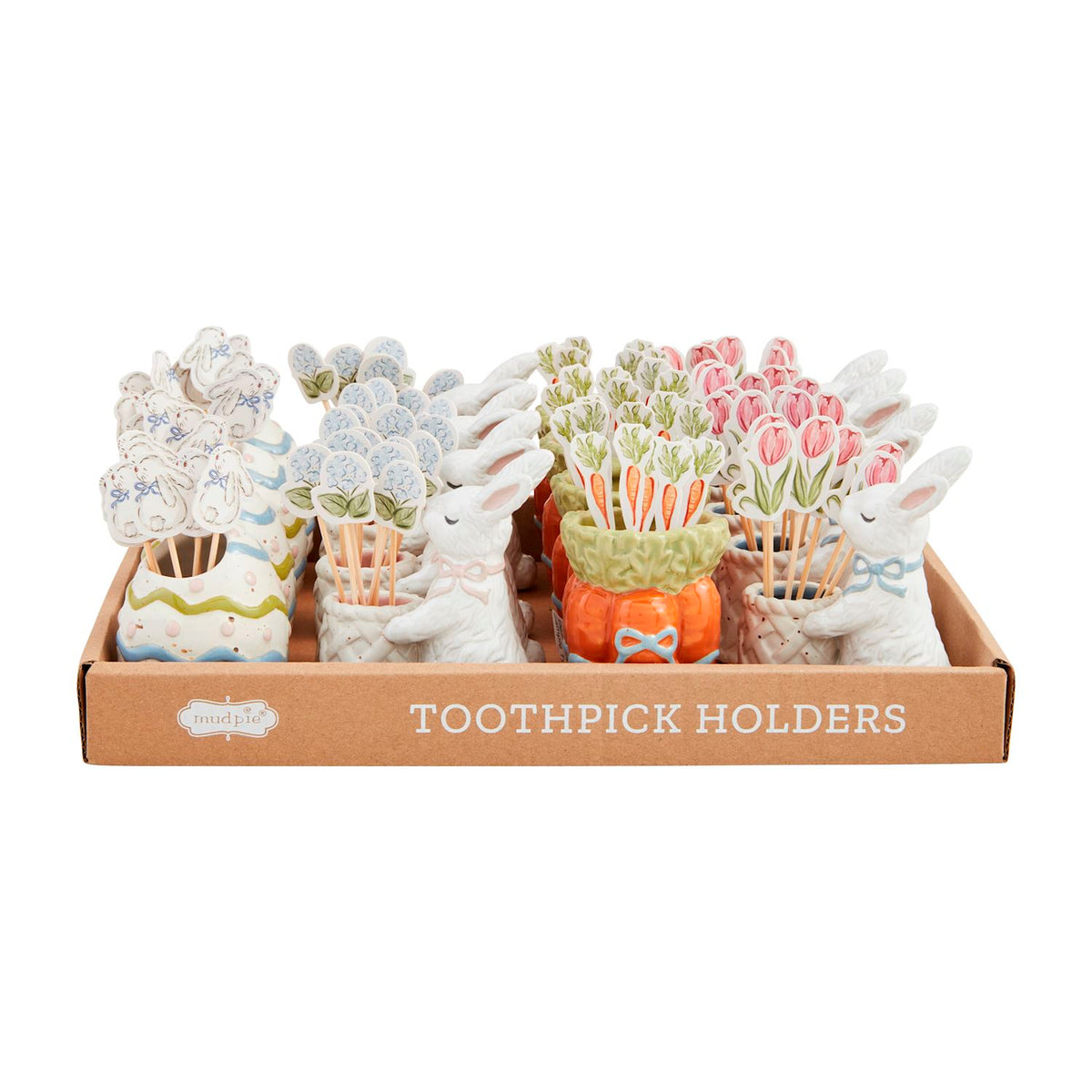 White ceramic Easter toothpick caddy with pastel floral pattern holding wooden picks