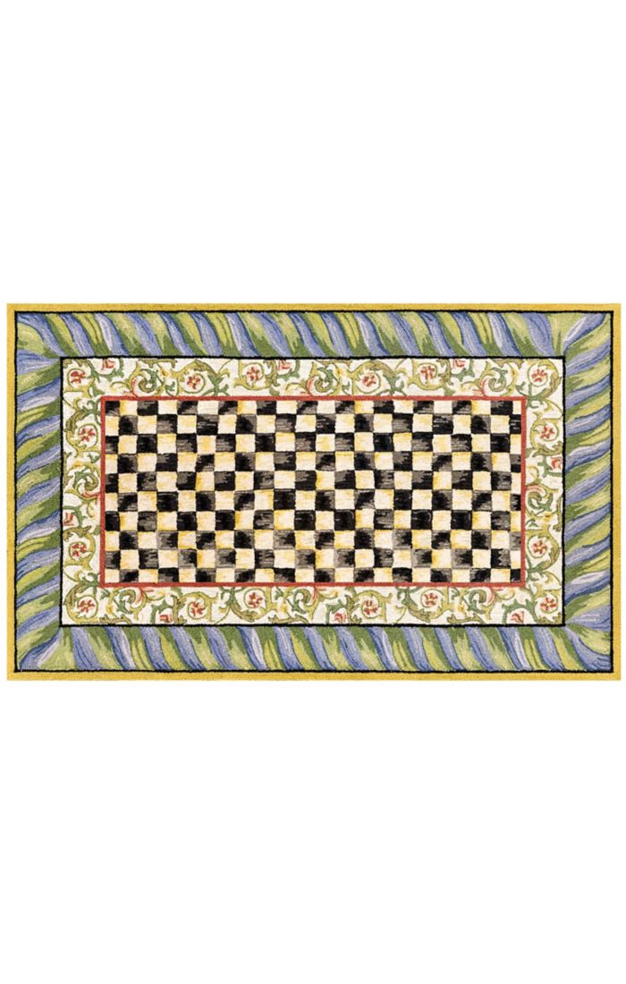 Purple and green checkered washable polyester area rug with a low pile height.