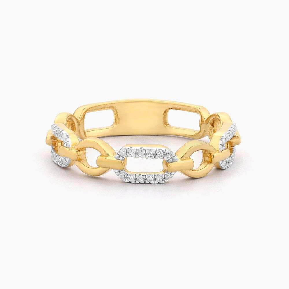 Stackable ring in gold-plated sterling silver featuring a small diamond accent with an intricate linked design.