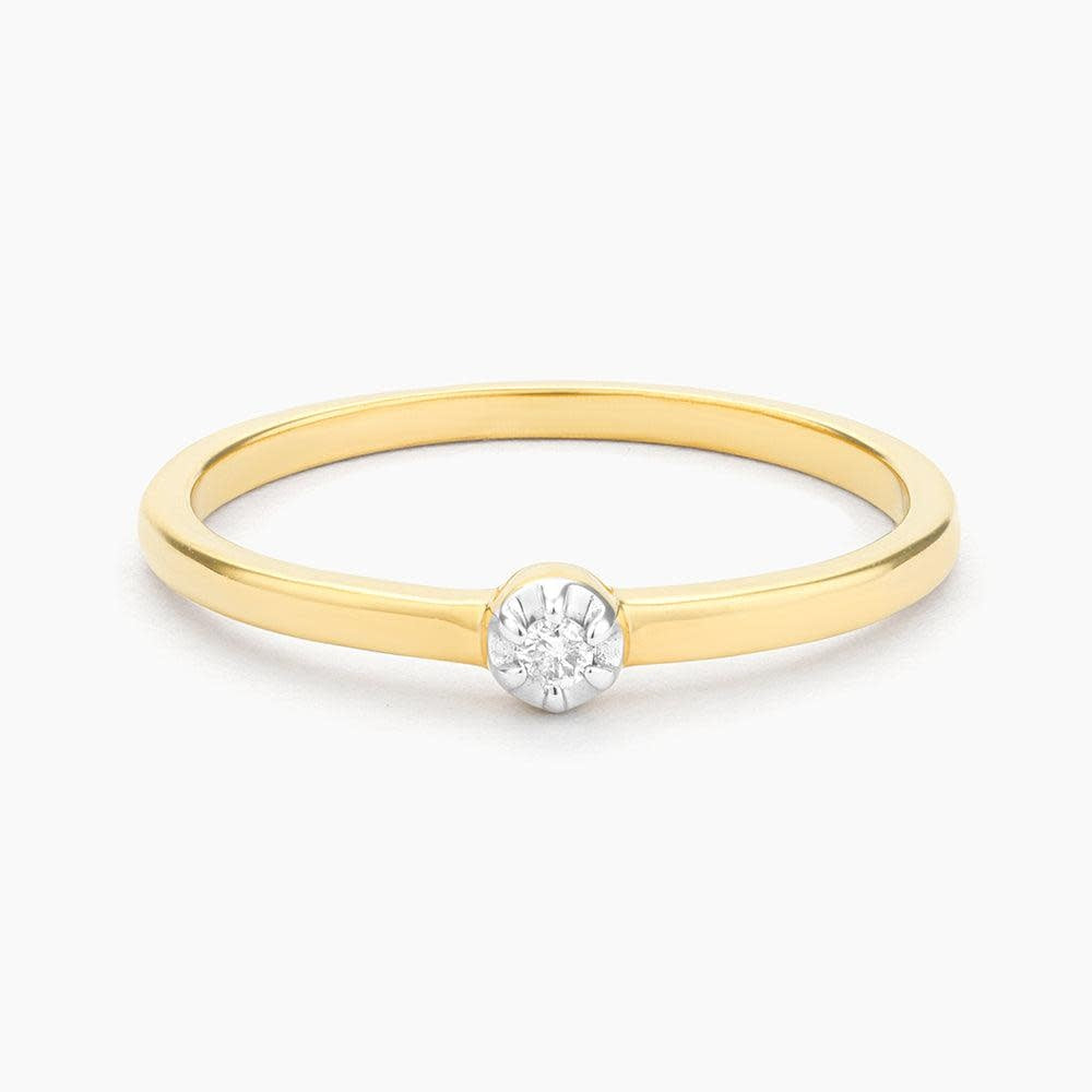 Stackable ring with a diamond halo centerpiece in silver metal