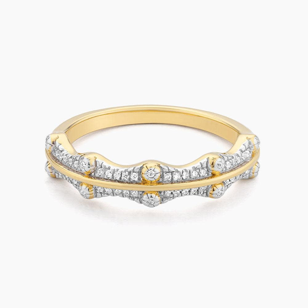 Diamond crown statement ring with a regal five-prong setting featuring sparkling stones on a polished metal band.