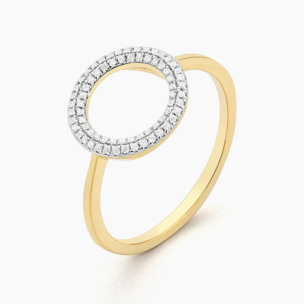 Silver statement ring with a diamond circle symbolizing infinite love.